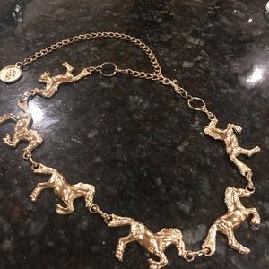 Gold plated running horse belt